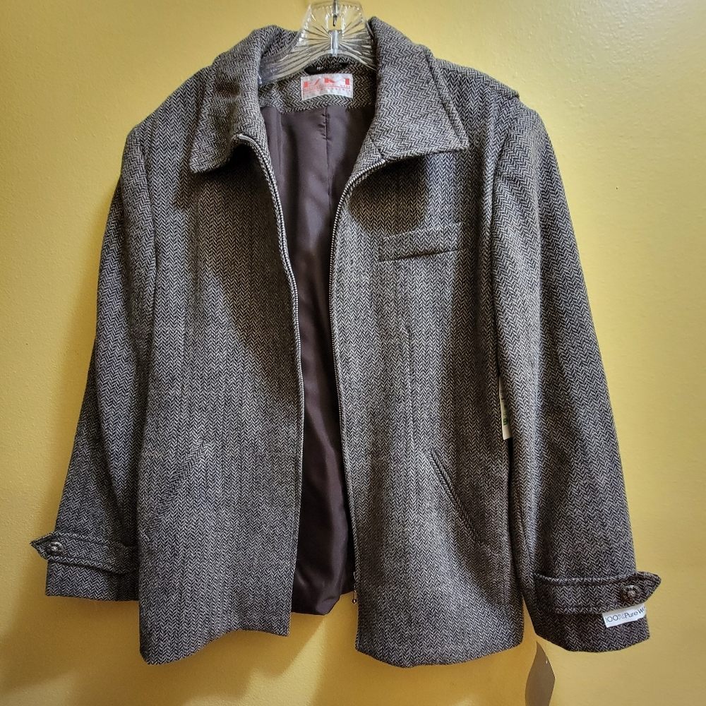 Eska Russian 100% wool jacket in a brown tweed herringbone fabric.
